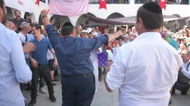 Jewish pilgrims take part in the procession of the 