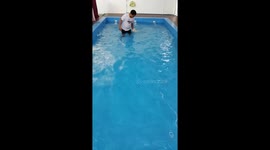 Pomeranian Learns To Swim