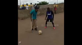 Nigerian schoolteacher on crutches shows off his skills on the football field