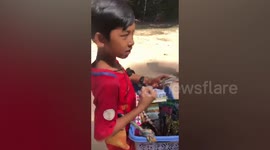Street vendor boy, 12, who speaks a dozen languages sent to school in China by wealthy benefactor