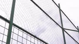 a slow shot of boys playing football