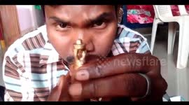 Miniature artist carves Cricket World Cup trophy on pencil tip to show team support