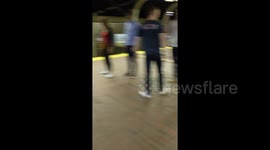 Elderly man starts impromptu session of Tai Chi at Boston train station