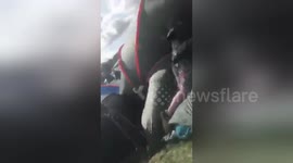 One drink too many perhaps? Man jumps into a tent for a laugh at Leeds Festival