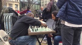 People enjoying nice weather in NYC Union Square Park