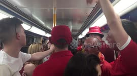 Liverpool fans on metro to stadium in good voice