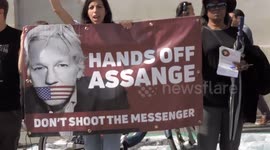Small crowd gathers in Trafalgar Square, London in support of Julian Assange