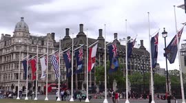 Flags of crown dependencies and overseas territories fly in Parliament Square ahead of Donald Trump's arrival