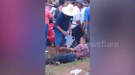 One killed and 14 injured after rocket misfires into crowd at festival in Thailand