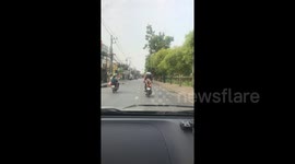 Thai motorcyclist arrested after standing on the seat while speeding down motorway