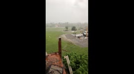 Kansas Tornado survivor films destruction, describing moment ears 'popped' as roof was ripped off home.