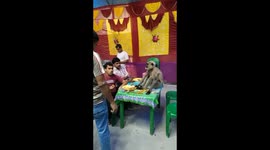 Cheeky monkey gatecrashes Indian wedding and demands food plate from guests