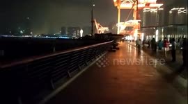 Cargo ship slams into riverbank after colliding with another boat in Shanghai