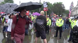 Anti -Trump Activist brave rain to protest against State Visit in London