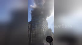 Huge clouds of smoke rise from building fire in Mayfair, London