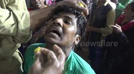 Thousands queue up to swallow live fish in bizarre Indian treatment for asthma