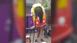 Hilarious moment UK woman got stuck and had to be cut out of children's toy car