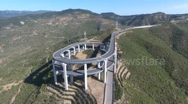 Spectacular drone footage of 3-storey highway built along China's Tianlong Mountain