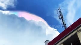Colourful cloud appeared in sky above Chinese city after rain