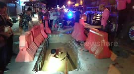 Moped Teens Crash Into Road Works Pit