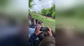 Competitor wins  annual cheese rolling for the forth time