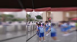 Chinese pupils scan faces at facial recognition gate to enter school