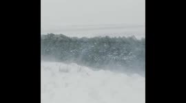 Out walking in the snow storm with my wife.