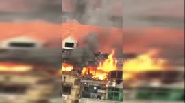 广东民房发生火灾 爸爸抱娃妈妈以身挡火护女丧生