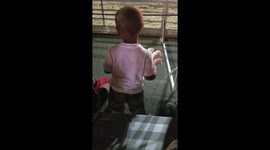 Cute baby dancing at fair