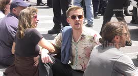 Extinction Rebellion protesters stop traffic and scale buildings in New York to protest climate emergency