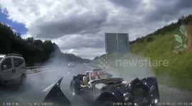 Moment UK driver has lucky escape after smashing into the back of traffic jam