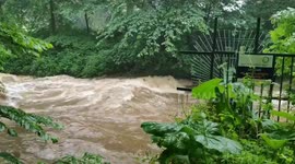 Raging river flows through Edinburgh after heavy downpours