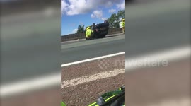 Motorist cheats death after his Mini flips five times - despite unbuckling his seat belt on the third flip