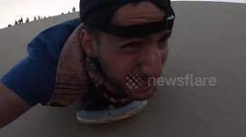 Travel vlogger gets 'destroyed' while sand boarding in Peru