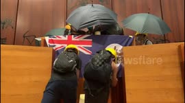 Hong Kong protesters take over legislative chamber