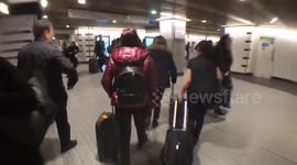 Frantic commuters on tube