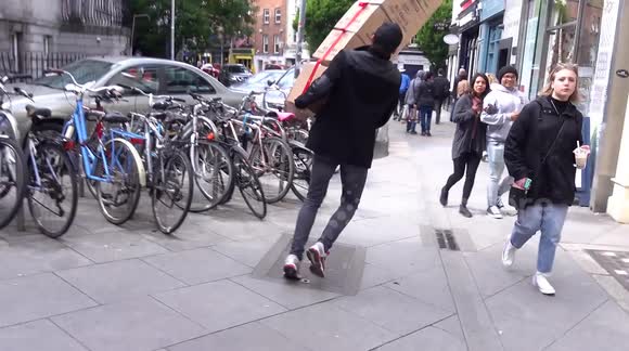 Ingenious Ireland pranksters trick public into thinking stack of boxes is falling on them