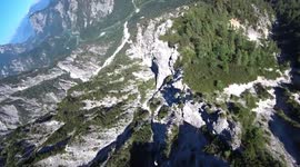 Don't look down! Base jumper glides through Austrian valley with epic wingsuit free fall