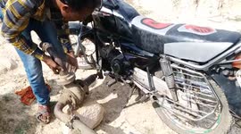 Unique  Motorcycle uses for pumping water in Northern India.