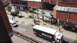 UK Man beats summer heat by starfishing in middle of pavement