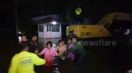 Hundreds evacuated after high tide breaks embankment flooding homes in Thailand