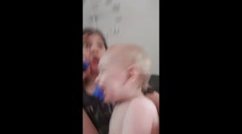 My daughter making my grandson laugh