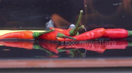 Sizzling hot chilli peppers so hot they give out smoke and flames!