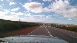 A 90-wagon iron ore train holds up traffic