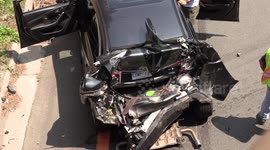 Spectacular crash in Toronto on the QEW highway with car crushed yet only very minor injuries as the Mazda's crumple zone absorbed all of the energy thus saving the occupants from harm