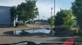 2 guys fight and a bike