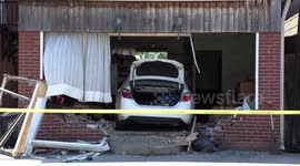 Car crashes into living room in Toronto this morning and police have two under arrest for impaired driving