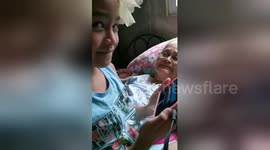 Newsflare Edit - Heartwarming moment as Philippines teenager sweetly serenades grandmother who suffered stroke