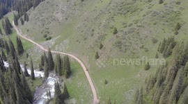 Drone video of Horses & People on the road to Altyn Arashan River