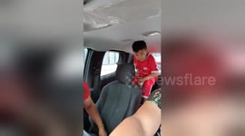 Hilarious moment boy accidentally sprays mother while peeing into bottle